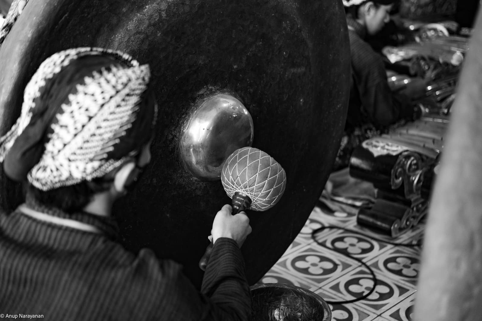 Gamelan performer and his gong.